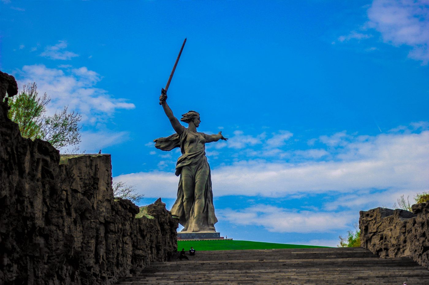 A woman statue in the middle of the countryside in Russia.